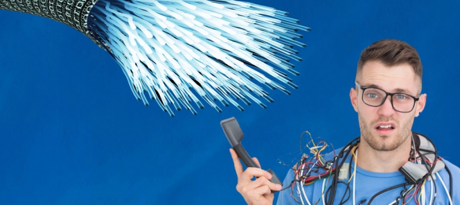 technicien empêtré dans des câbles