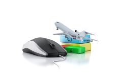 avion, valises et souris d'ordinateur