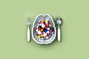 compléments alimentaires dans un bol en forme de cerveau