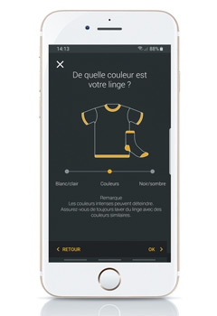 smartphone avec une appli de gestion de lave-linge