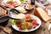 Du fromage à raclette fondu