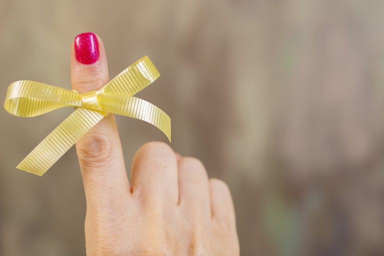 Un ruban jaune figurant la lutte contre l'endométriose