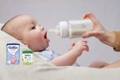 Un bébé et les boites de lait en poudre pour bébé rappelés par Danone
